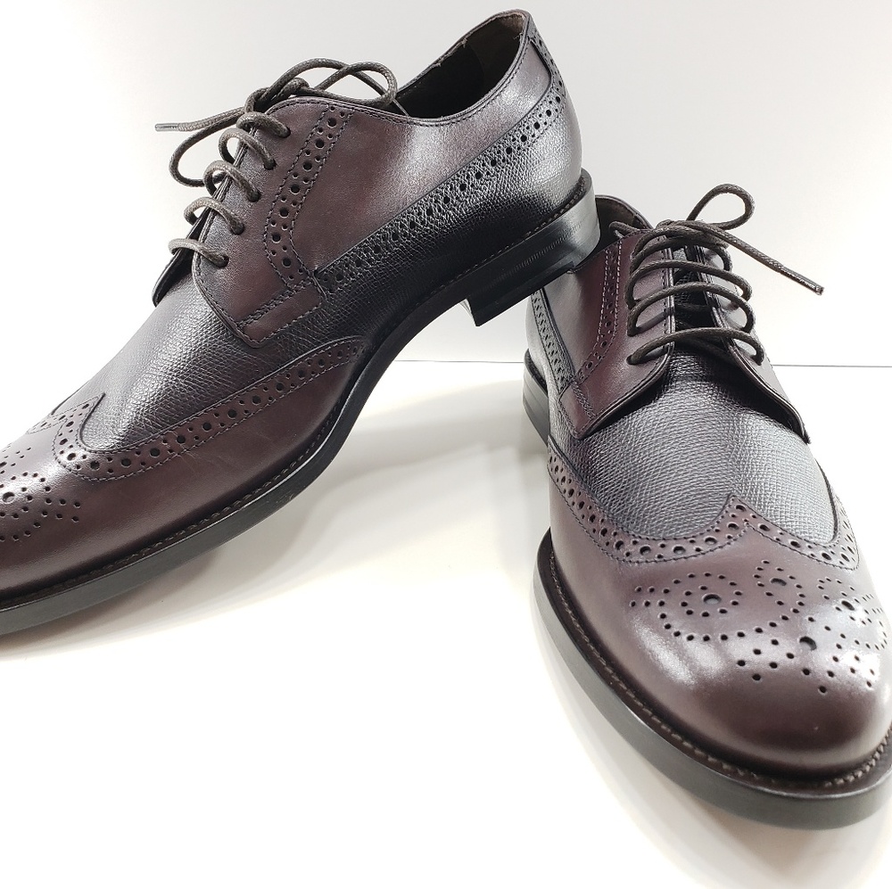 Hand-stitched burgundy wingtip shoes